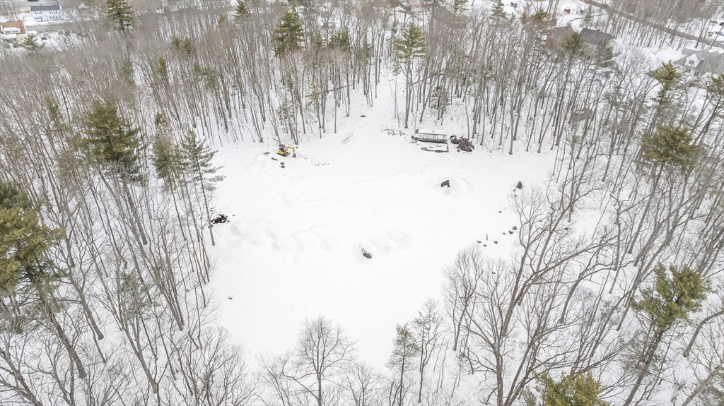 54 Rabbit Road Salisbury, MA 01952 - Photo 26 of 37 a view of snow in between of trees