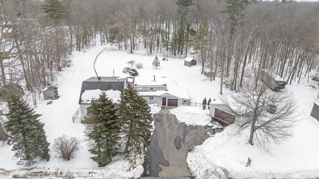 54 Rabbit Road Salisbury, MA 01952 - Photo 31 of 37 a view of roof covered with snow in front of house