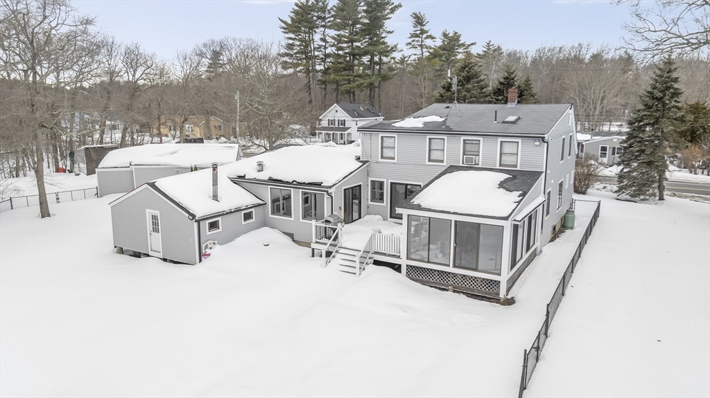 54 Rabbit Road Salisbury, MA 01952 - Photo 34 of 37 an aerial view of a house with swimming pool and sitting space