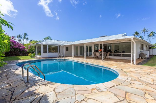a view of a house with swimming pool
