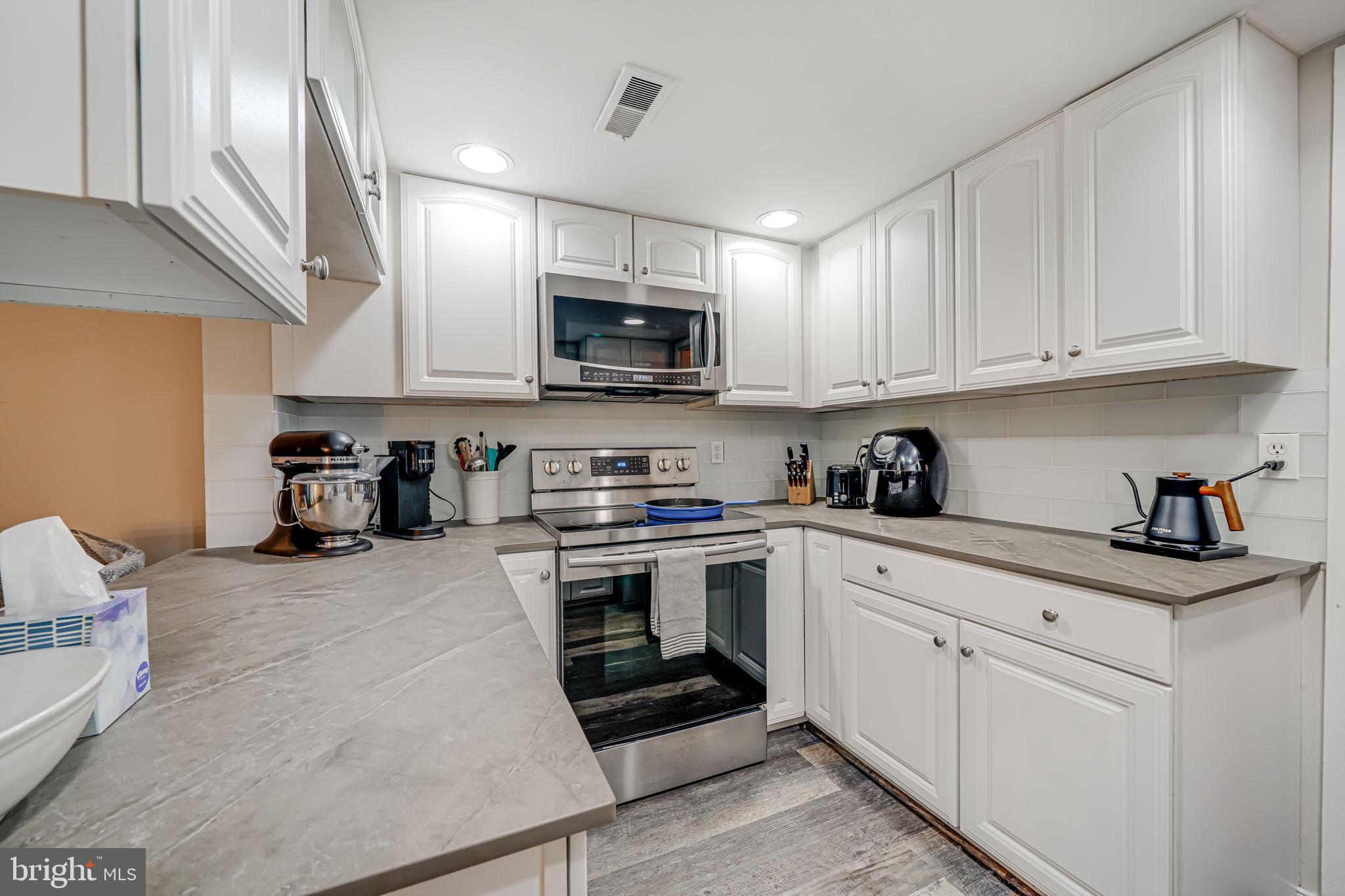 1825 Ivy Oak Square Reston, VA 20190 - Photo 13 of 37 Check out the DEKTON countertops!