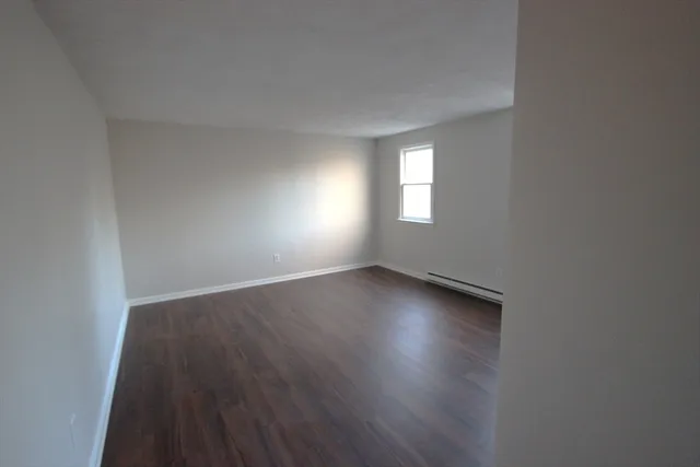 a utility room with sink dryer and washer