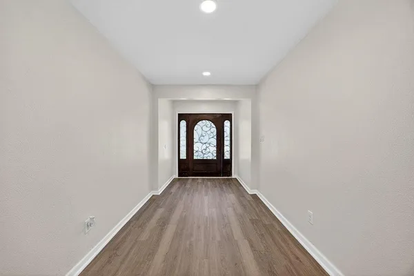 a view of an empty room and window
