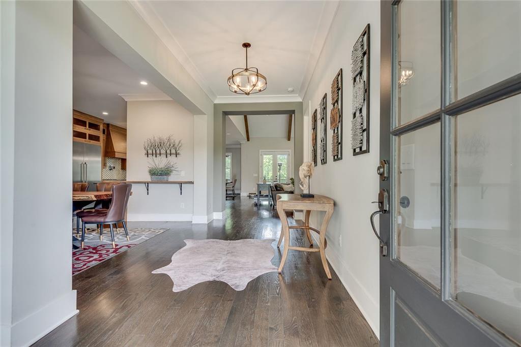 2503 Sugar Pike Road Canton, GA 30115 - Photo 64 of 134 a living room with furniture and a wooden floor