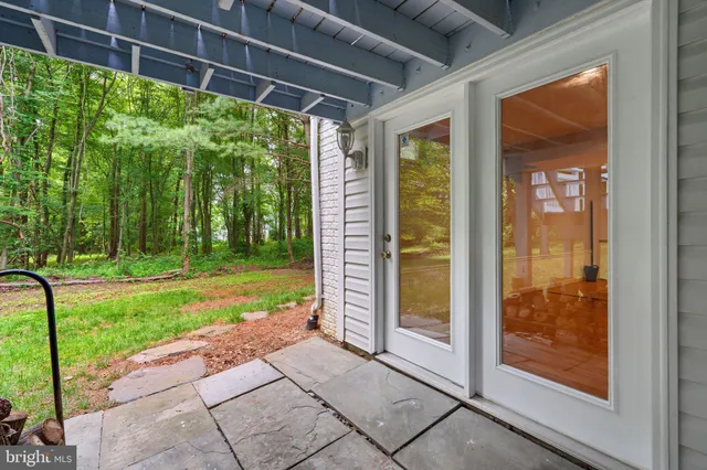 a view of backyard with green space