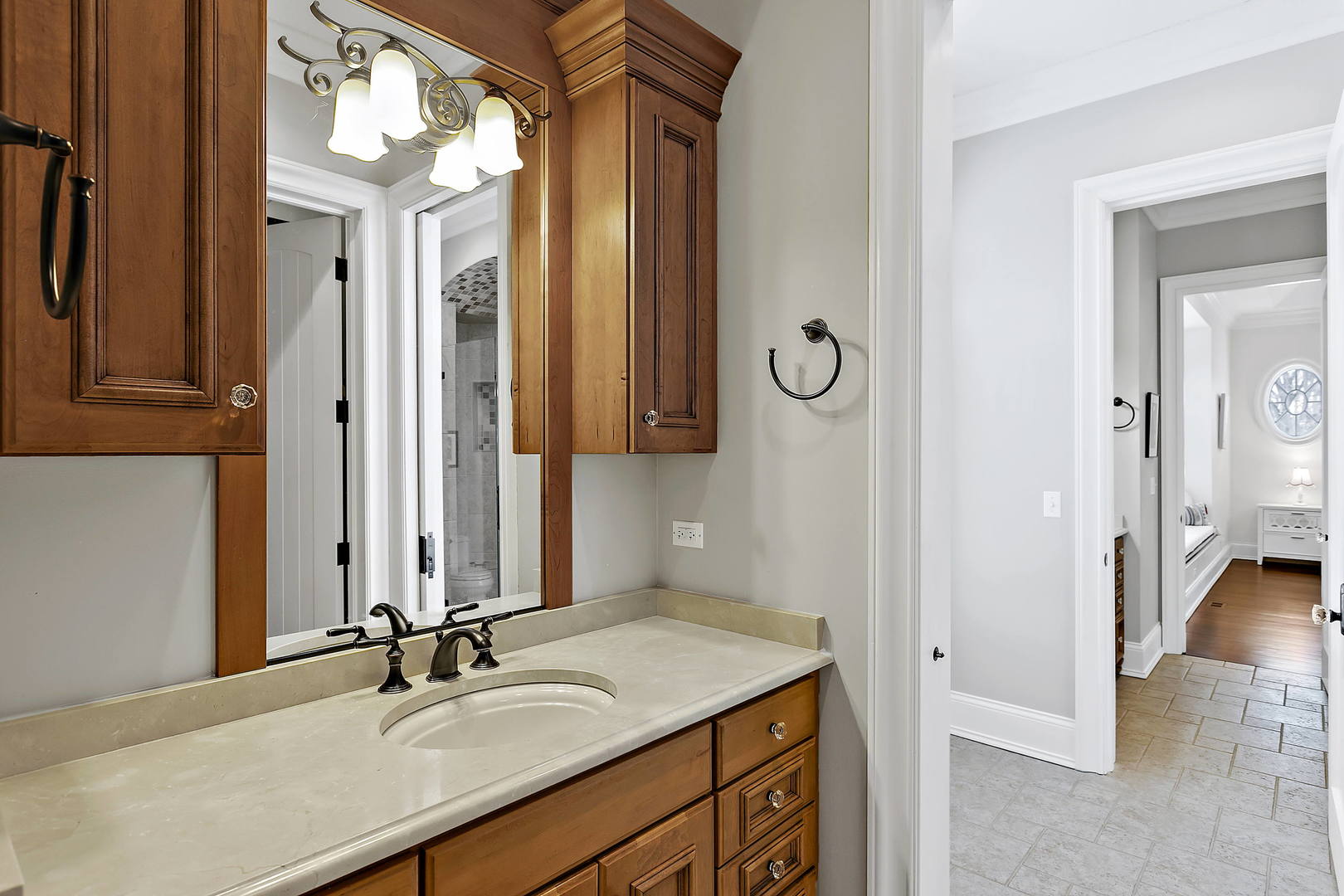 217 North Haman Road Inverness, IL 60010 - Photo 28 of 61 a bathroom with a sink and a mirror