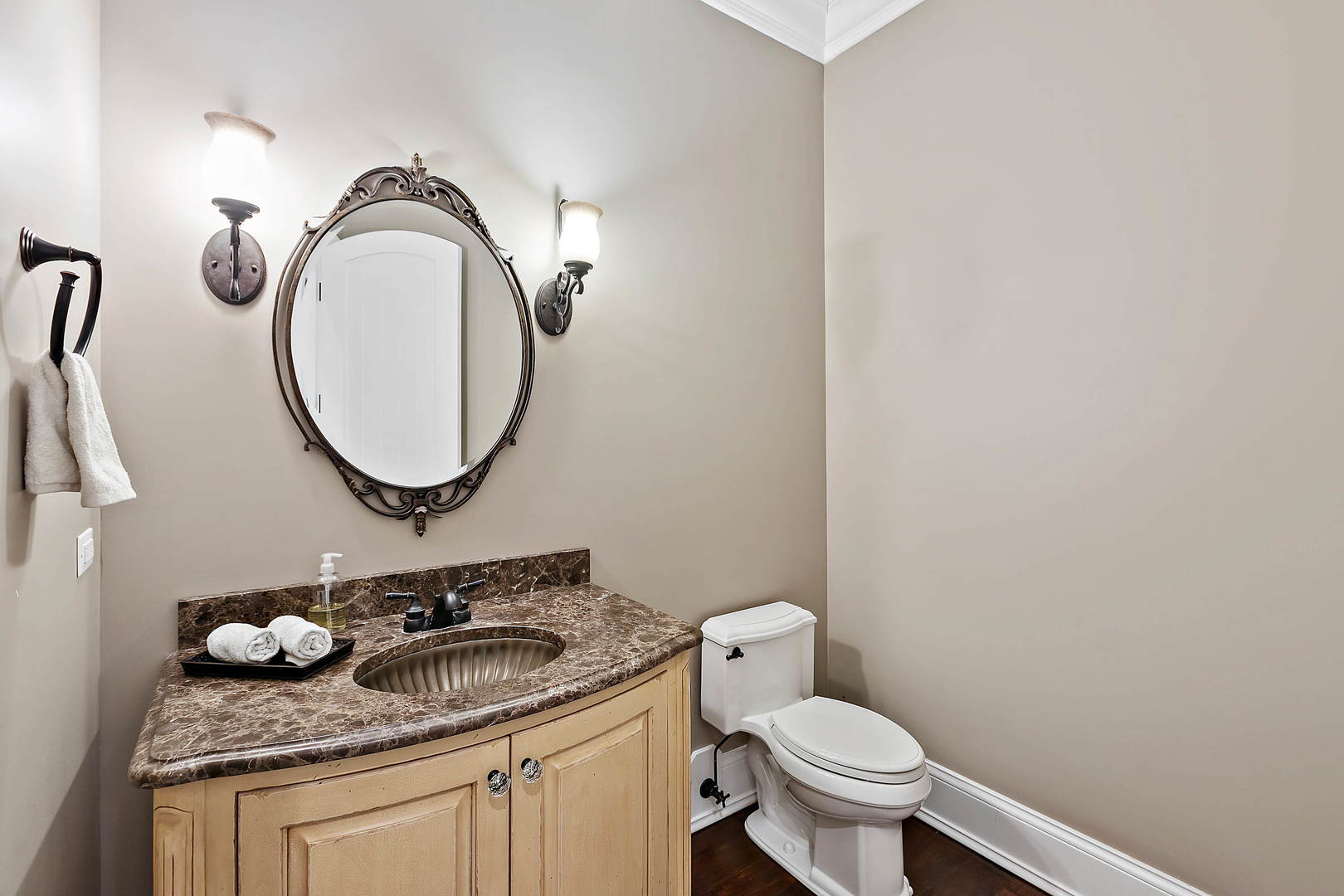 217 North Haman Road Inverness, IL 60010 - Photo 32 of 61 a bathroom with a granite countertop toilet sink and mirror
