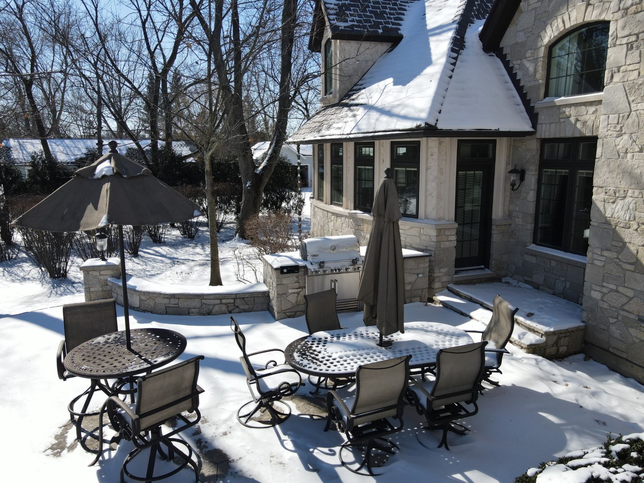 217 North Haman Road Inverness, IL 60010 - Photo 53 of 61 a view of a patio with table and chairs and potted plants