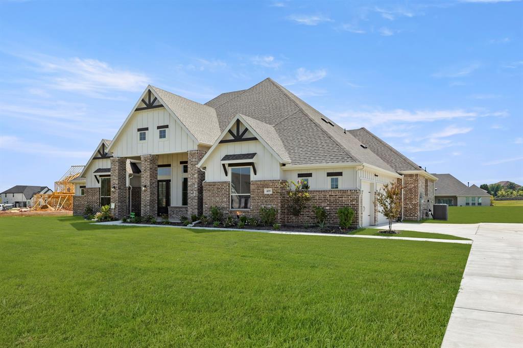 409 Spoonbill Road Sunnyvale, TX 75182 - Photo 3 of 31 02. 409 Spoonbill - Front (2)