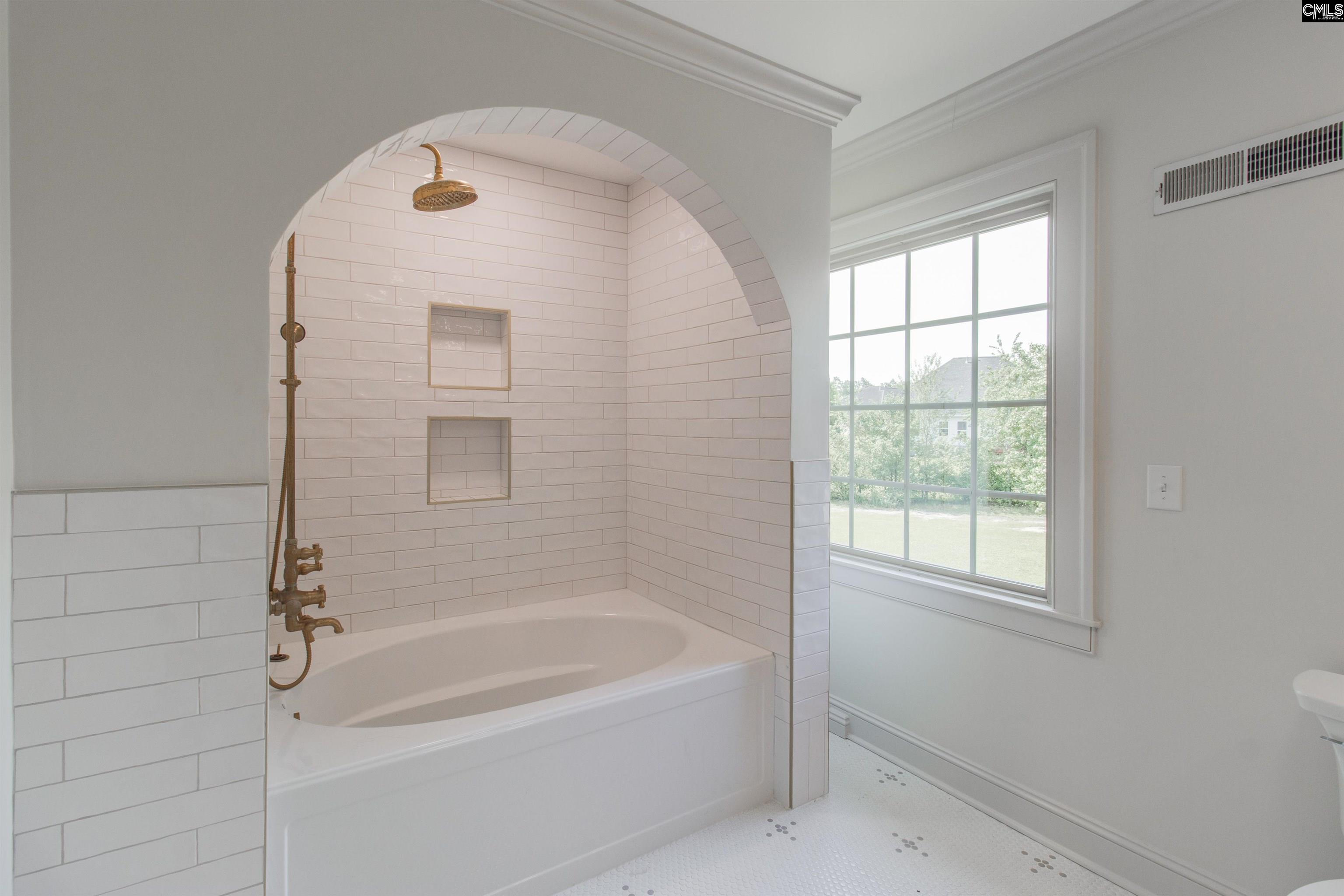 701 Longtown Road Columbia, SC 29229 - Photo 5 of 26 a spacious bathroom with a bathtub and a shower