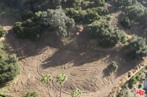 a view of a lake with mountain in the back