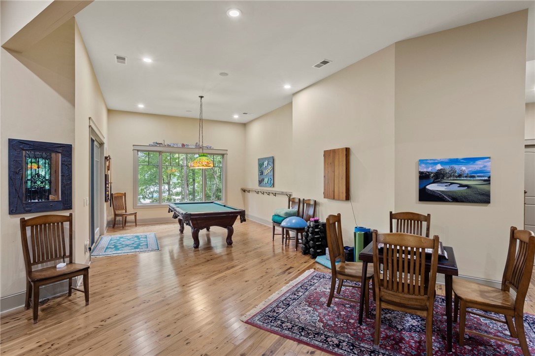 117 Sunrise Ridge Sunset, SC 29685 - Photo 29 of 44 Hardwood flooring flows throughout this vast recreation room, ideal for entertaining and relaxation.