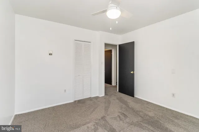 an empty room with a bathroom