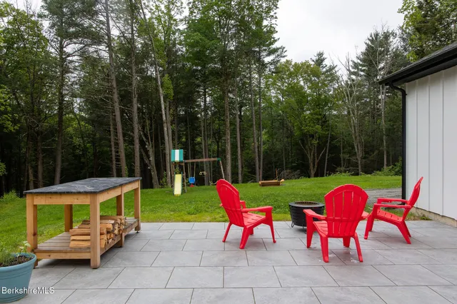 a view of chairs with a small yard