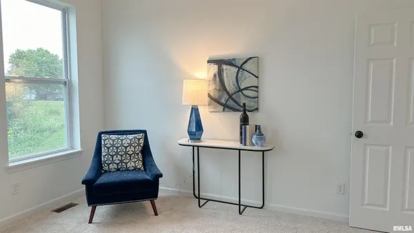 a kitchen with kitchen island a refrigerator a stove a sink and a refrigerator