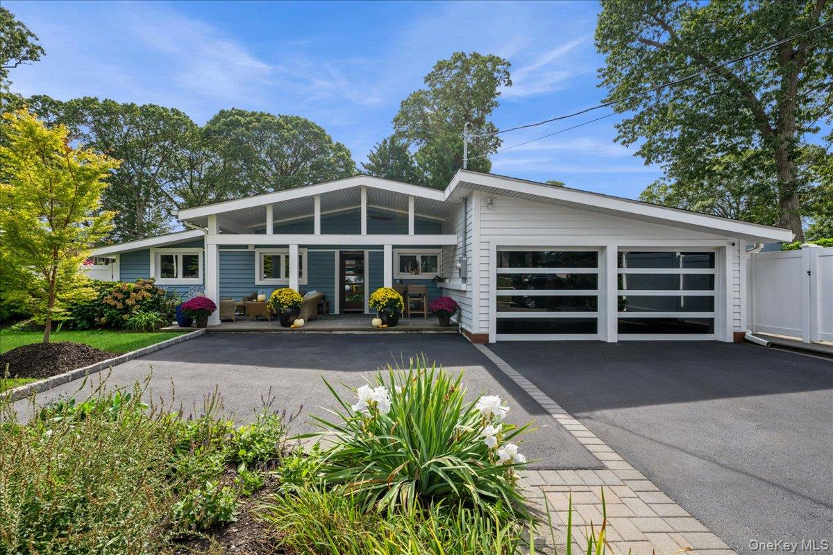 92 Suffolk Road Massapequa, NY 11758 - Photo 1 of 1 a view of a house with a yard