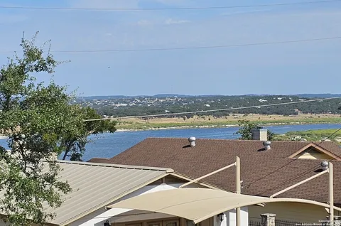 an aerial view of a house with a outdoor space
