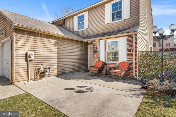 a backyard of a house with seating space