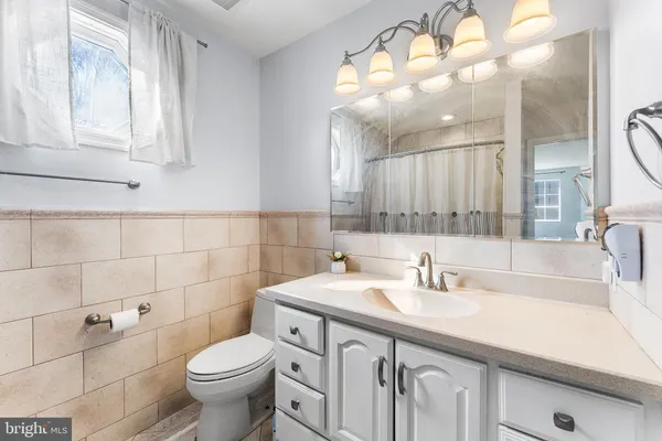 a bathroom with a sink and a toilet