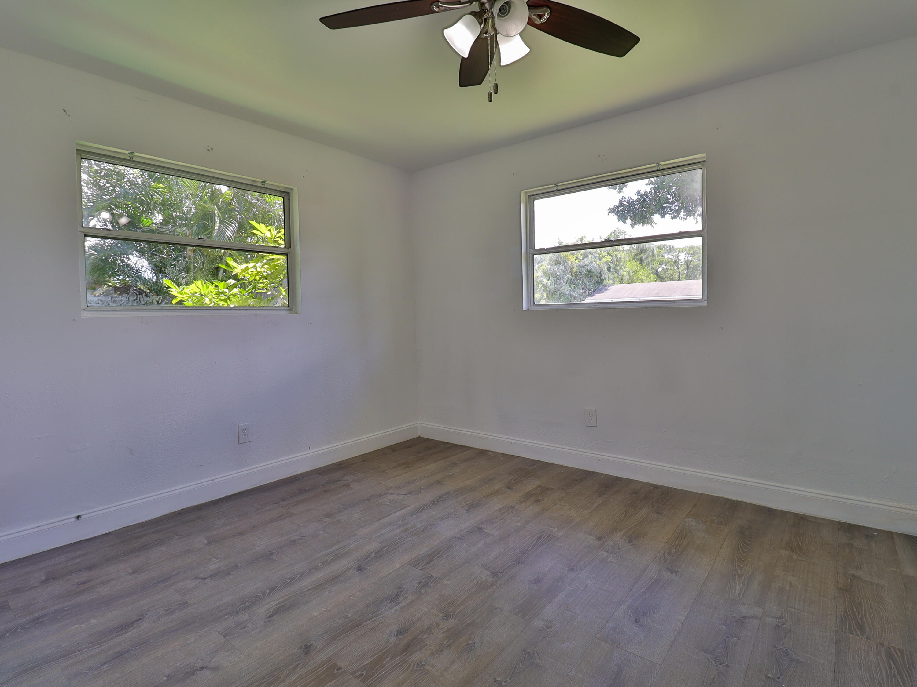 3024 West Dixie Boulevard Fort Pierce, FL 34946 - Photo 22 of 26 a view of an empty room with a window
