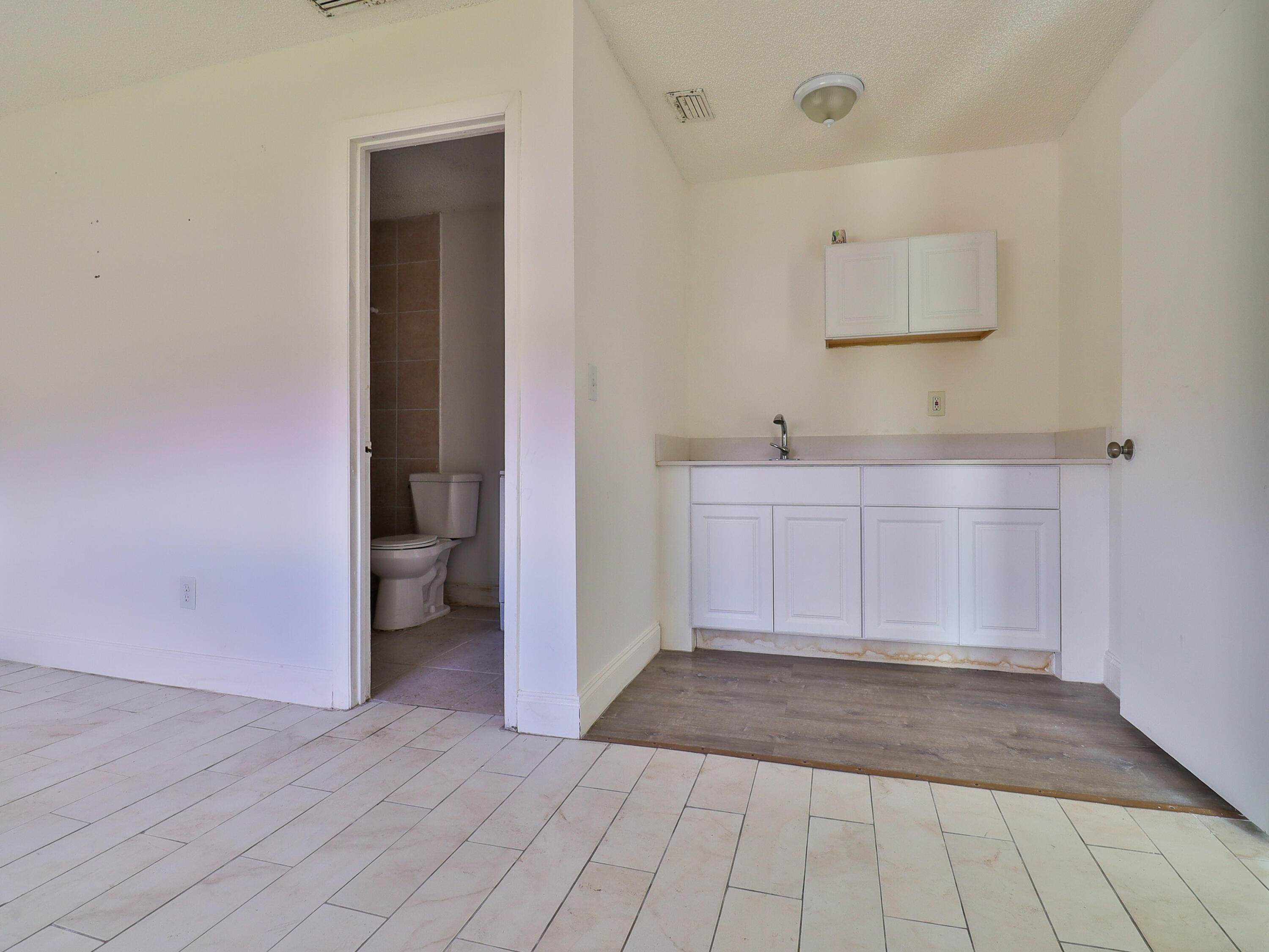 3024 West Dixie Boulevard Fort Pierce, FL 34946 - Photo 9 of 26 sink and bathroom