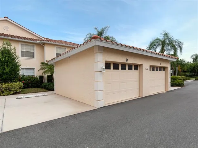 a front view of a house with a garage