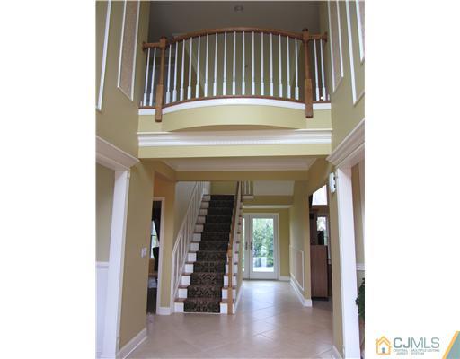 8 Keppel Road Plainsboro, NJ 08536 - Photo 2 of 22 a view of a hallway with windows