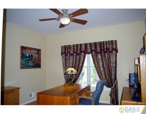 8 Keppel Road Plainsboro, NJ 08536 - Photo 11 of 22 a living room with furniture and a window