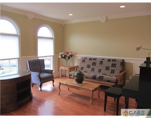 8 Keppel Road Plainsboro, NJ 08536 - Photo 4 of 22 a living room with furniture and a large window