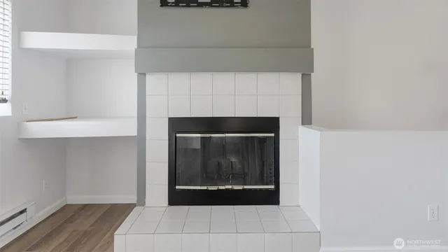 a hallway with a fireplace