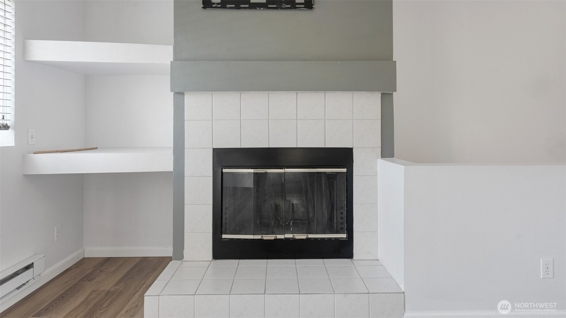 23118 59th Place South, Unit 154 Kent, WA 98032 - Photo 11 of 25 a hallway with a fireplace