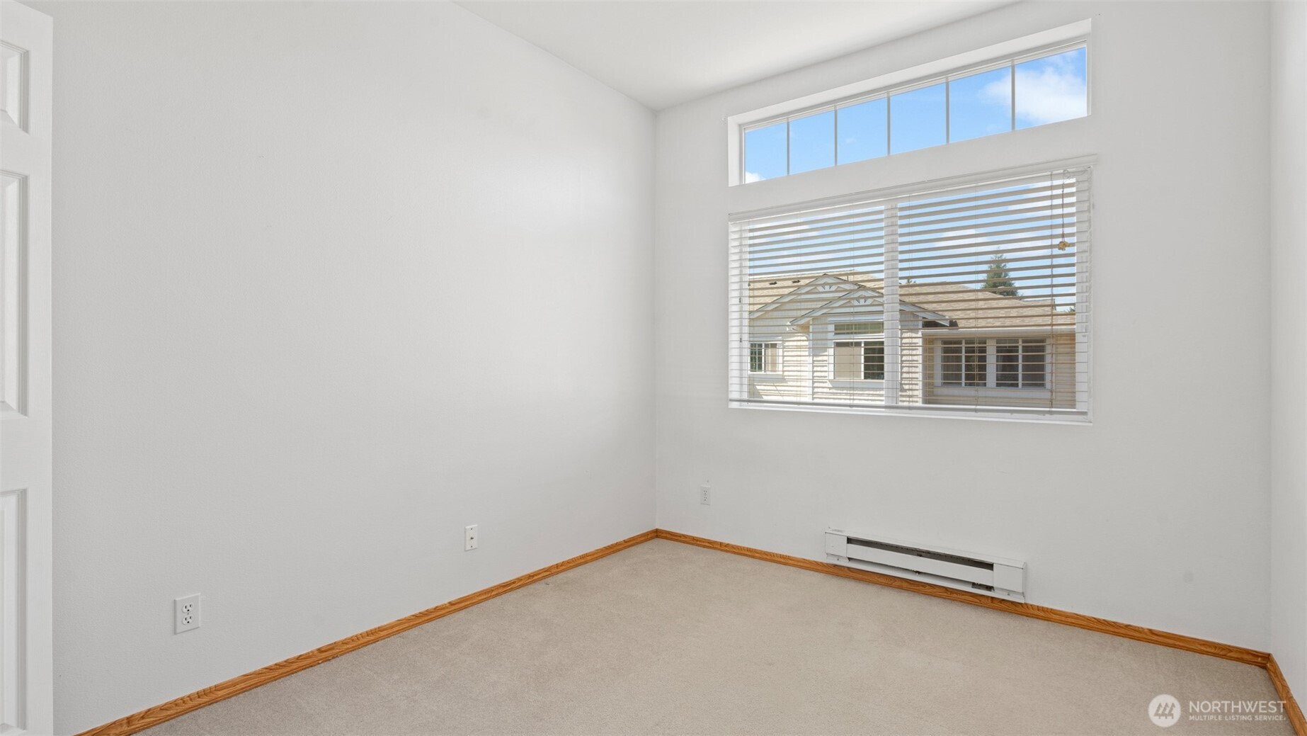 23118 59th Place South, Unit 154 Kent, WA 98032 - Photo 12 of 25 a view of a room with a window