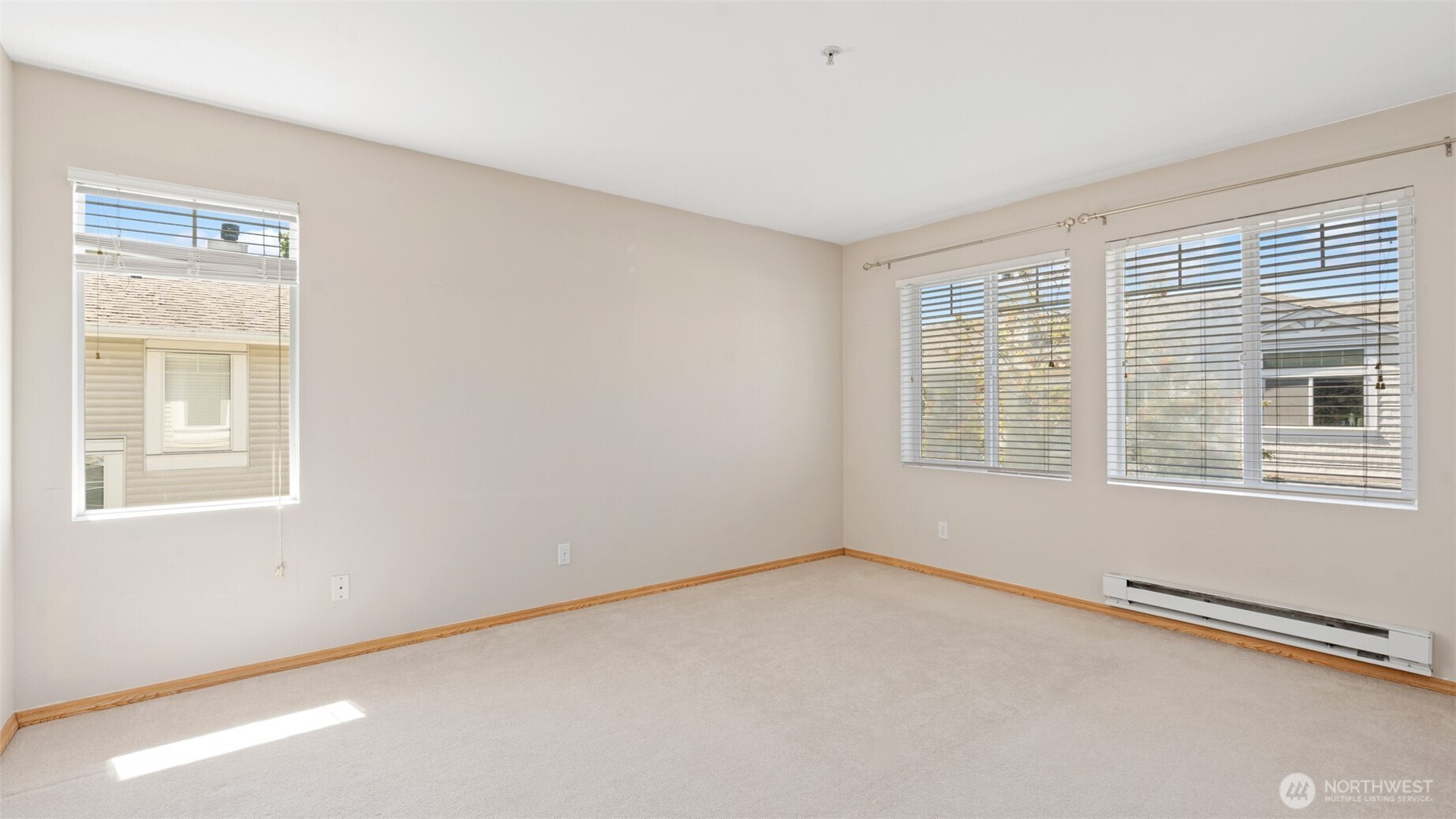 23118 59th Place South, Unit 154 Kent, WA 98032 - Photo 14 of 25 a view of an empty room with a window