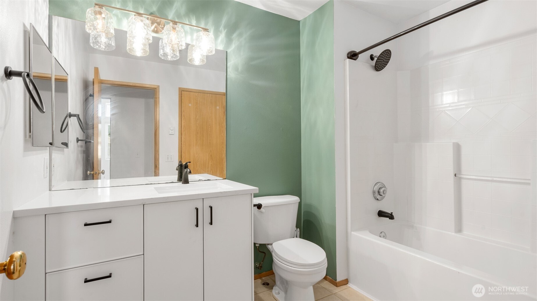 23118 59th Place South, Unit 154 Kent, WA 98032 - Photo 16 of 25 a bathroom with a sink a toilet and shower