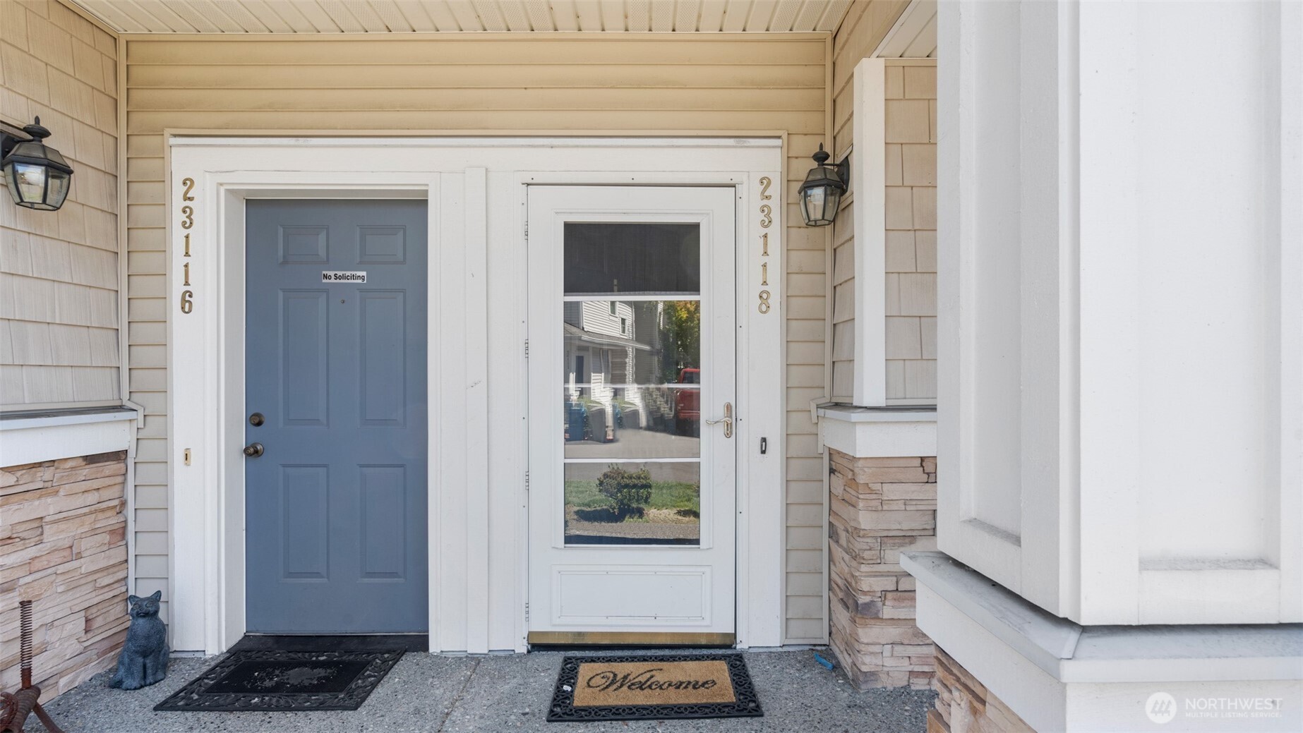 23118 59th Place South, Unit 154 Kent, WA 98032 - Photo 2 of 25 a view of a entryway door of the house