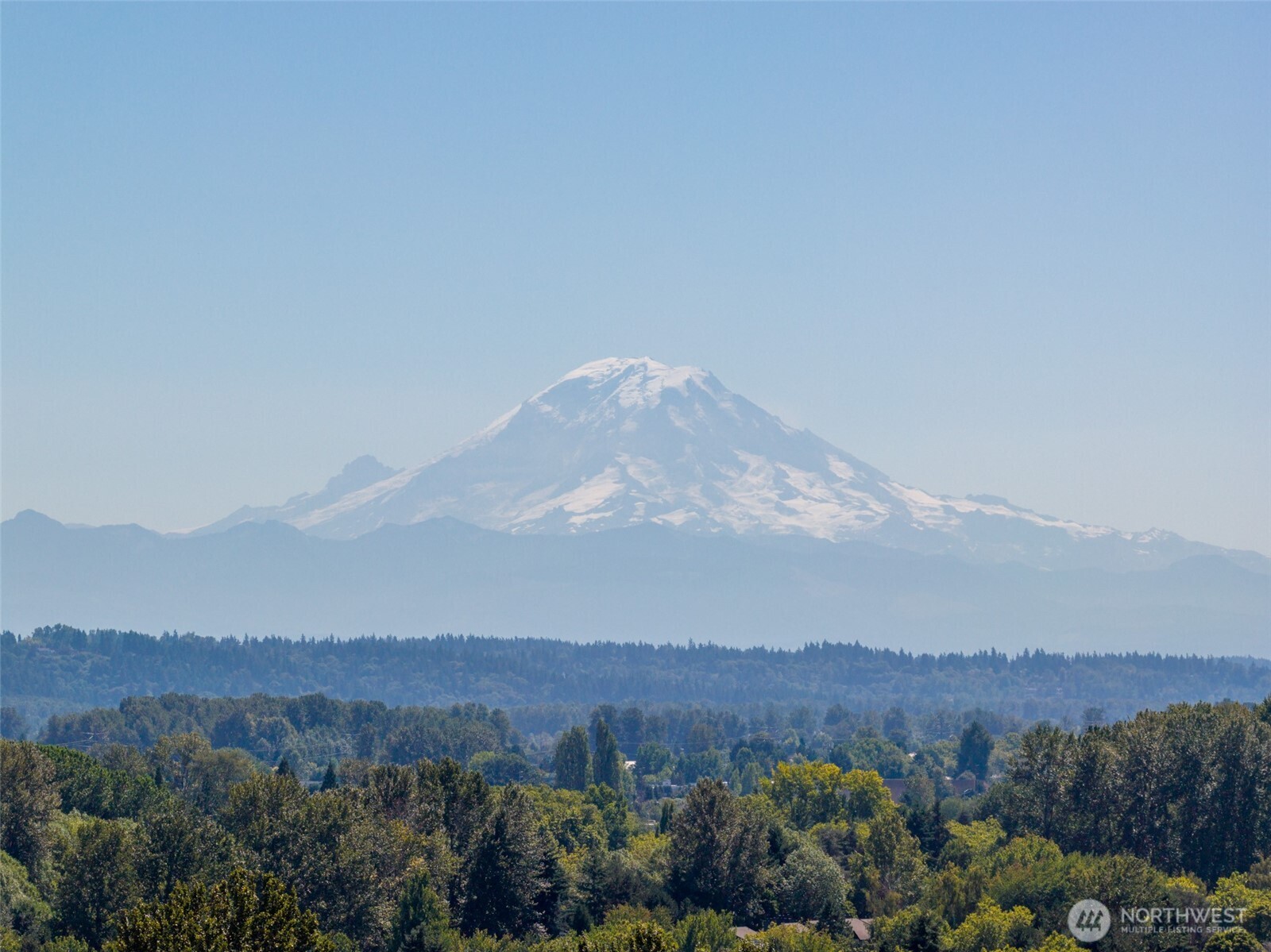 23118 59th Place South, Unit 154 Kent, WA 98032 - Photo 24 of 25 a view of a large mountain with mountains in the background