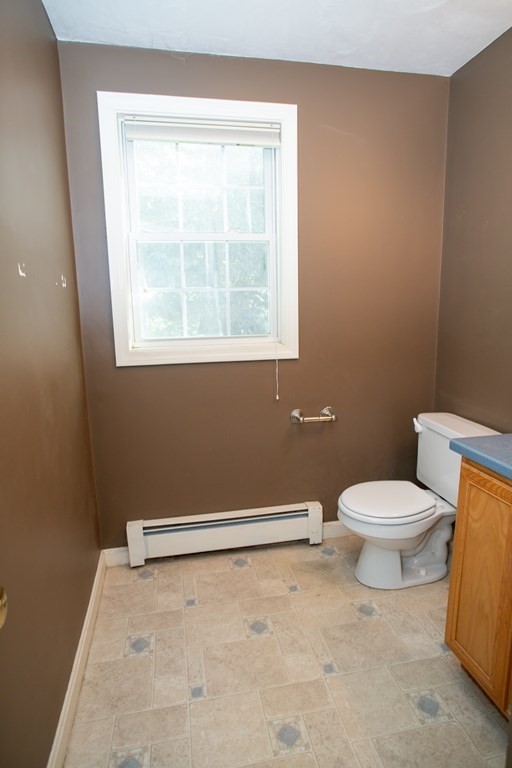 64 Bishop Road Fitchburg, MA 01420 - Photo 18 of 40 a white toilet sitting next to a window