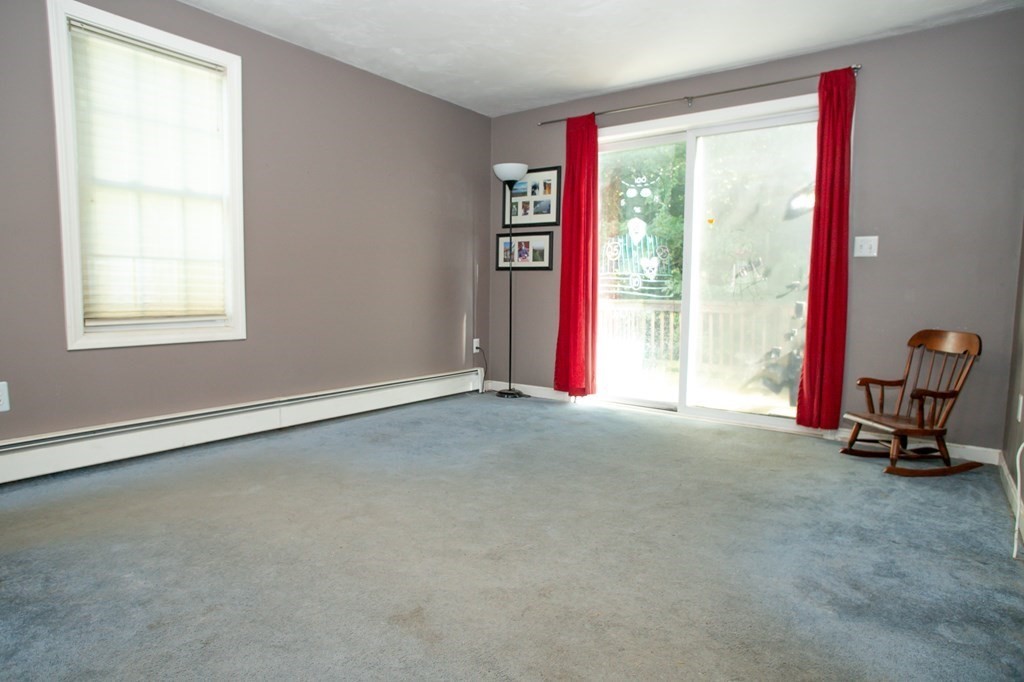 64 Bishop Road Fitchburg, MA 01420 - Photo 20 of 40 a view of a room with gym equipment and a large window