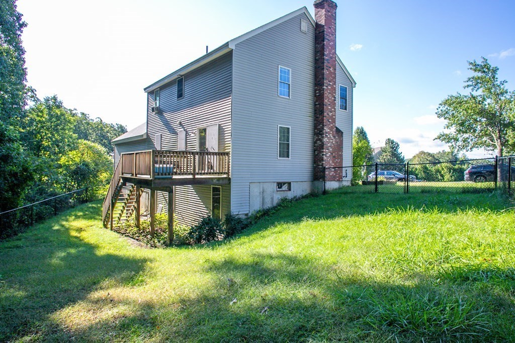 64 Bishop Road Fitchburg, MA 01420 - Photo 21 of 40 front view of a house with a yard