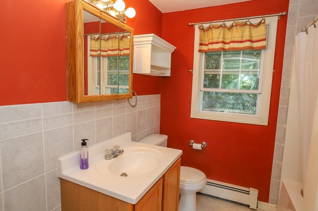 64 Bishop Road Fitchburg, MA 01420 - Photo 31 of 40 a bathroom with a sink and a window