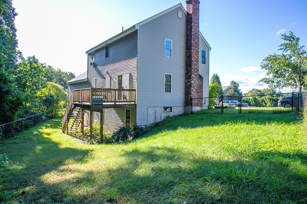 64 Bishop Road Fitchburg, MA 01420 - Photo 37 of 40 front view of a house with a yard