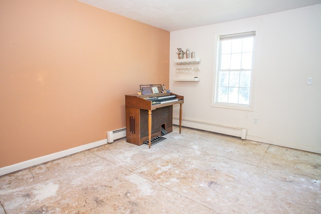 64 Bishop Road Fitchburg, MA 01420 - Photo 10 of 40 an empty room with windows