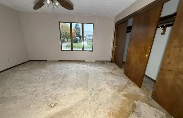 an empty room with windows