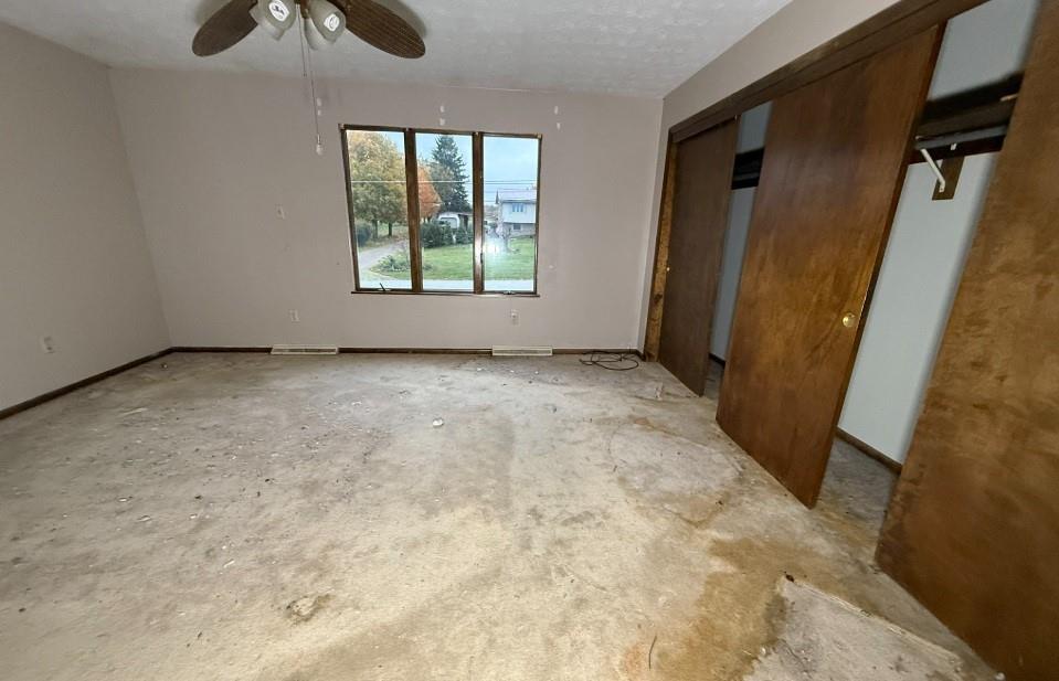 133 Cemetery Road Vanderbilt, PA 15486 - Photo 13 of 29 an empty room with windows