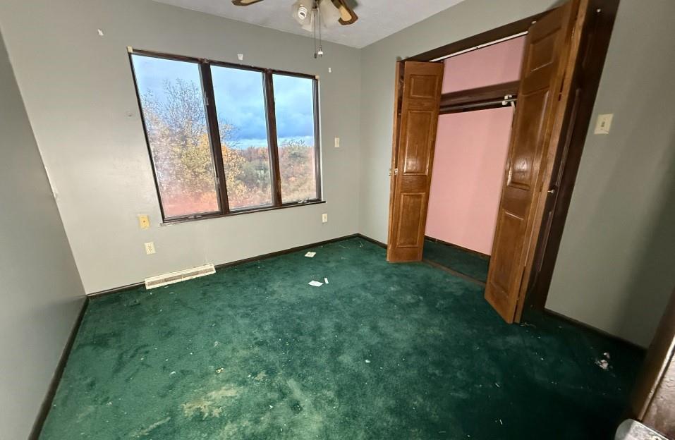 133 Cemetery Road Vanderbilt, PA 15486 - Photo 14 of 29 an empty room with windows