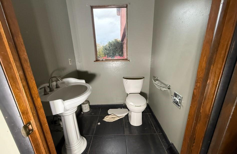 133 Cemetery Road Vanderbilt, PA 15486 - Photo 19 of 29 a bathroom with a toilet and a sink