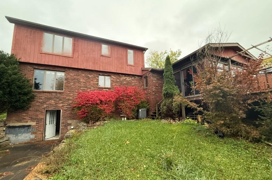 133 Cemetery Road Vanderbilt, PA 15486 - Photo 23 of 29 a front view of a house with garden