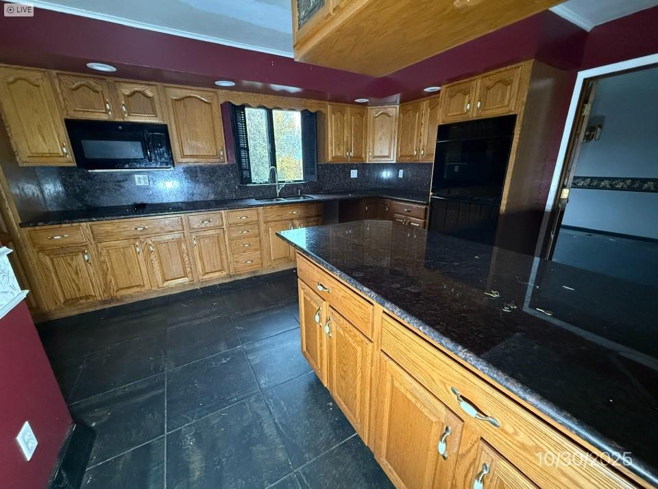133 Cemetery Road Vanderbilt, PA 15486 - Photo 5 of 29 a kitchen with stainless steel appliances granite countertop a sink stove and cabinets