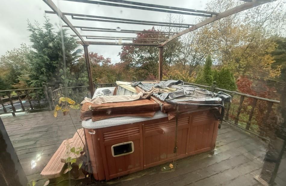 133 Cemetery Road Vanderbilt, PA 15486 - Photo 10 of 29 a roof deck with table and chairs a barbeque with wooden floor