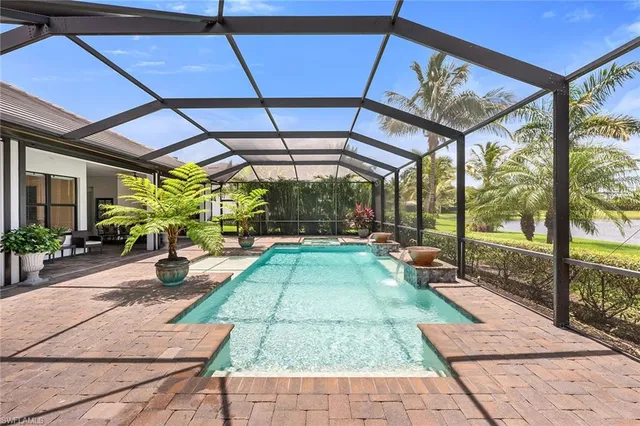 a view of swimming pool with a patio